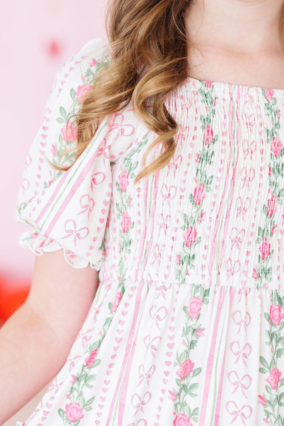 roses and ribbon patterned girls dress