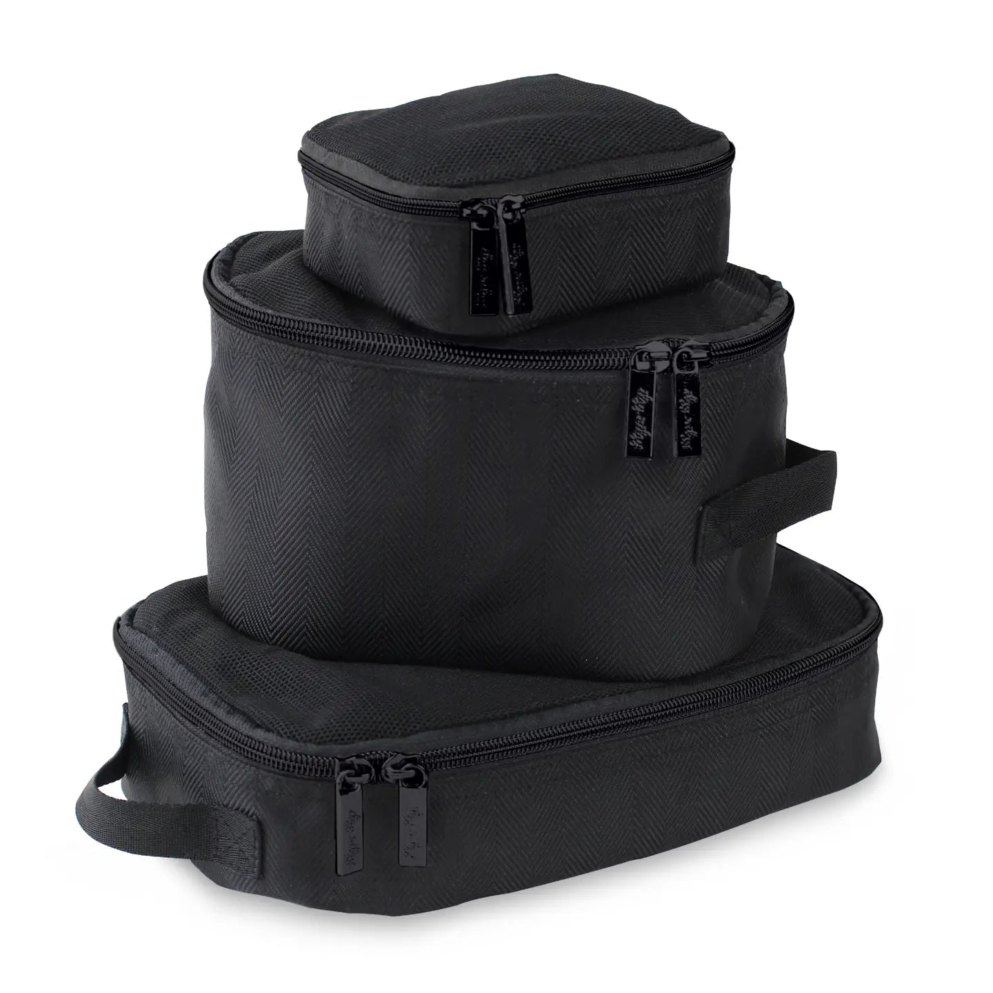 Set of three black packing cubes stacked on a white background