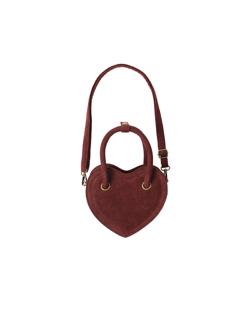 Heart-shaped handbag with a strap