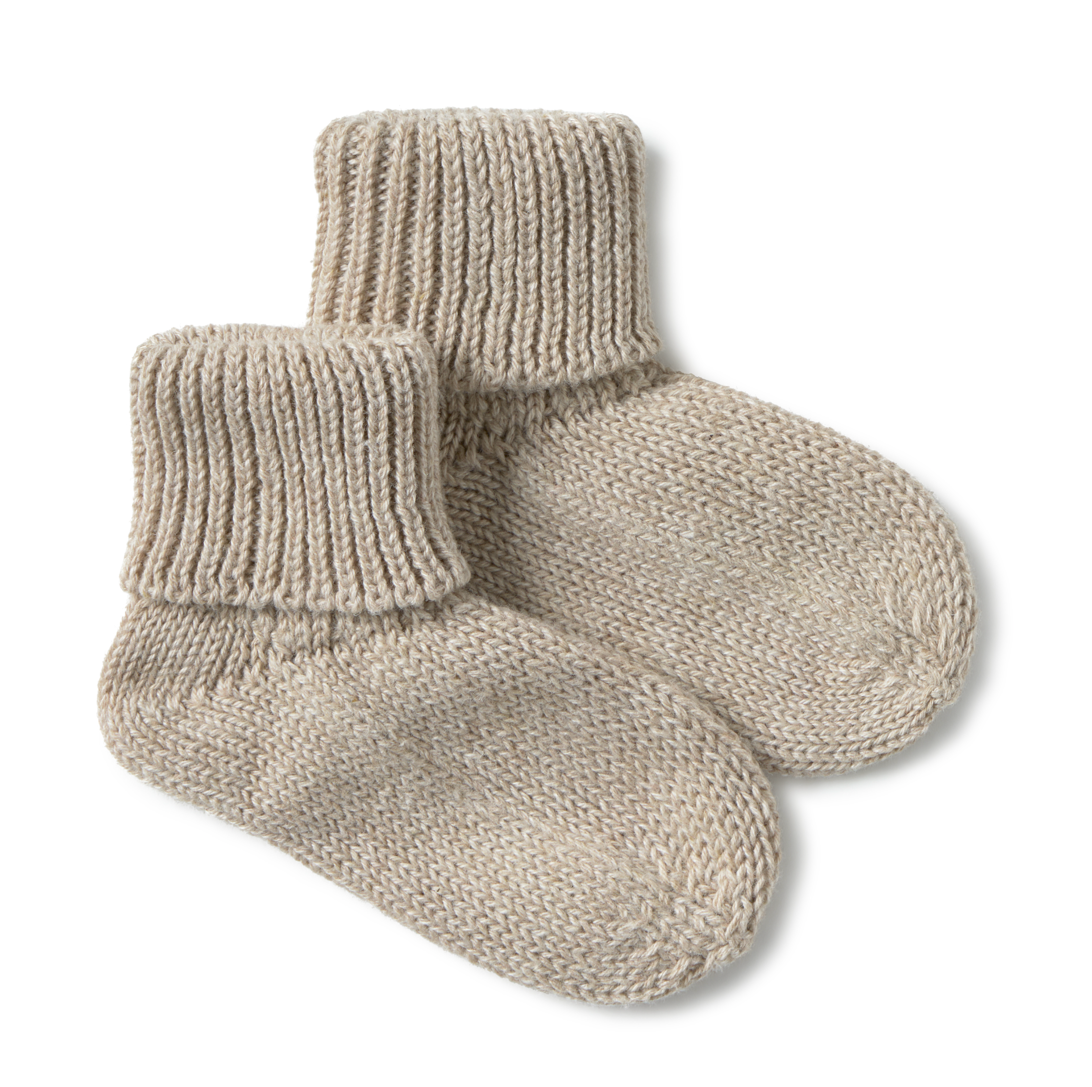 Pair of beige knitted socks on a white background