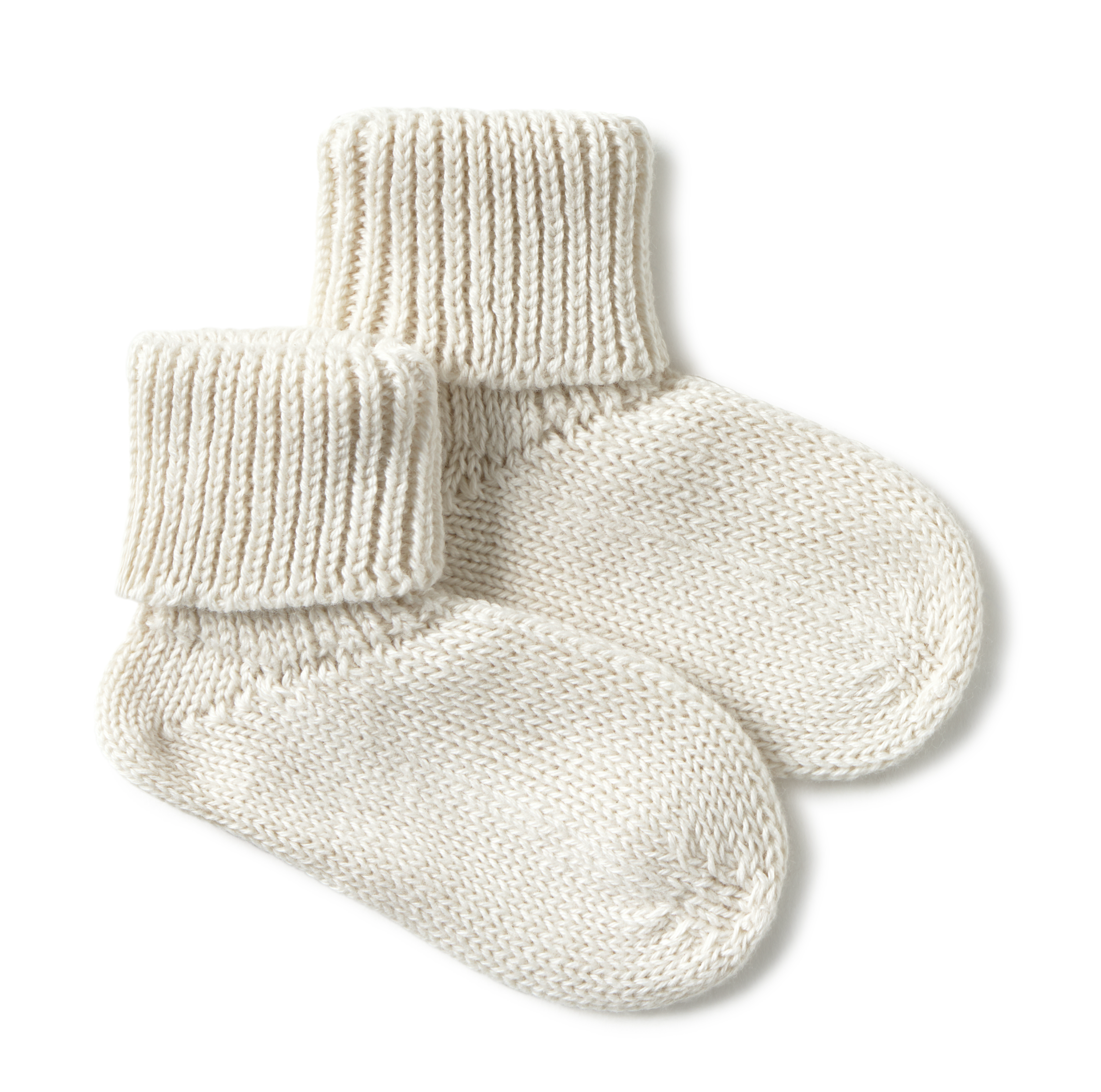 Pair of white knitted socks on a white background