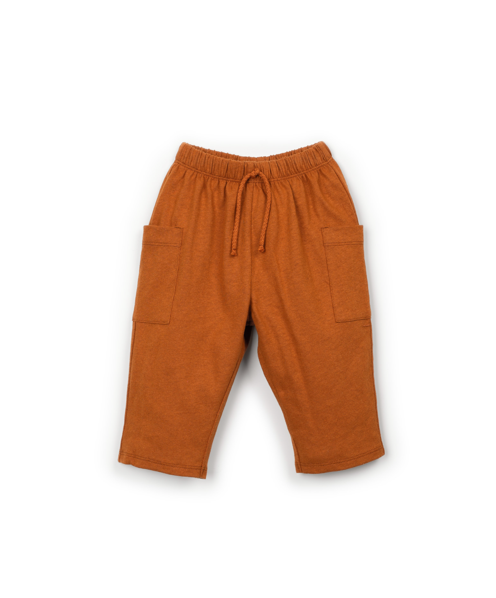 Orange cotton and linen pants with an adjustable waistband and pockets