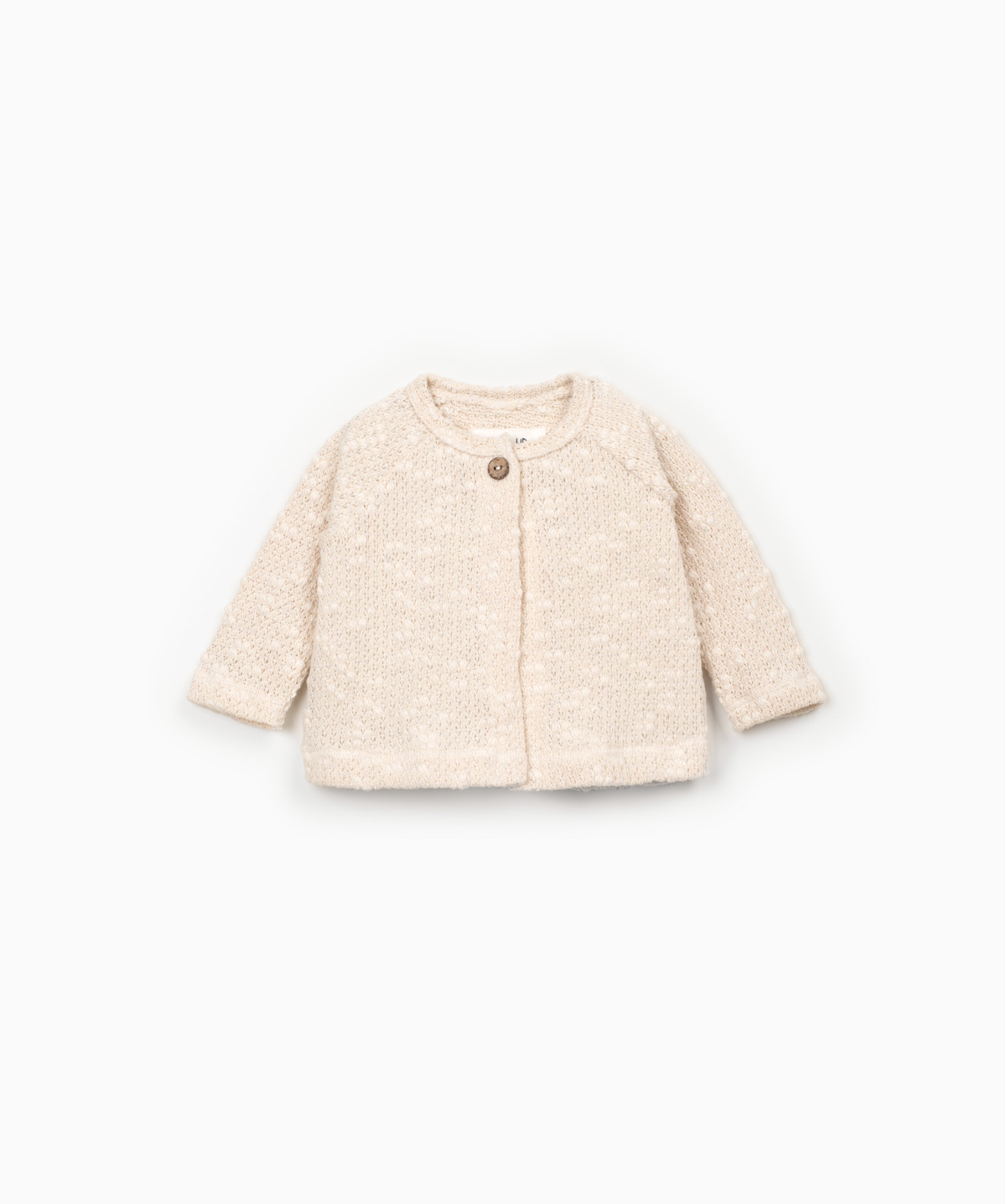 Beige cardigan with singular button at the top