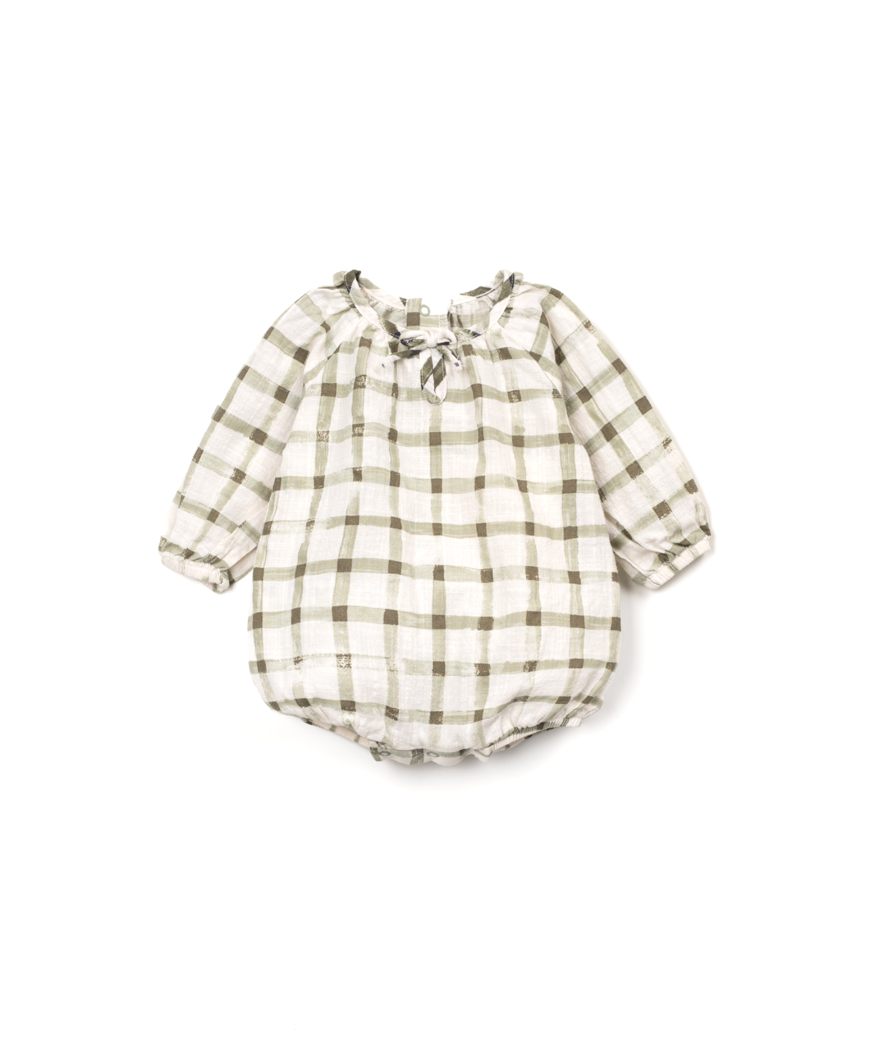 Green plaid baby romper with a bow on a white background