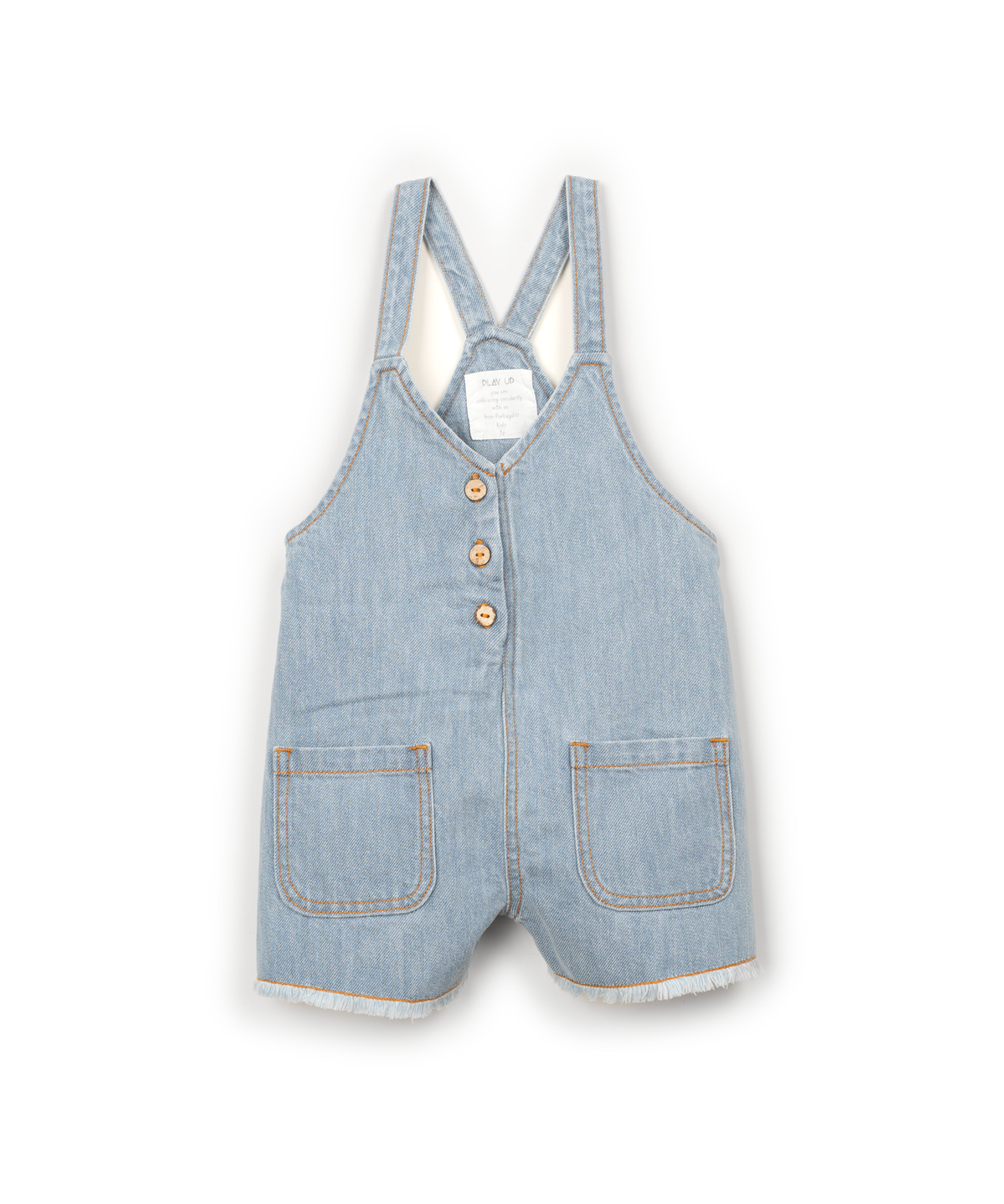Light blue denim cotton overalls with buttons and pockets on a white background