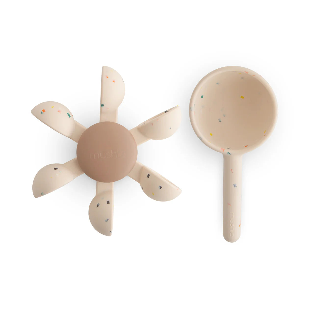 Beige spoon and bowl bath toy set with speckled pattern on a white background