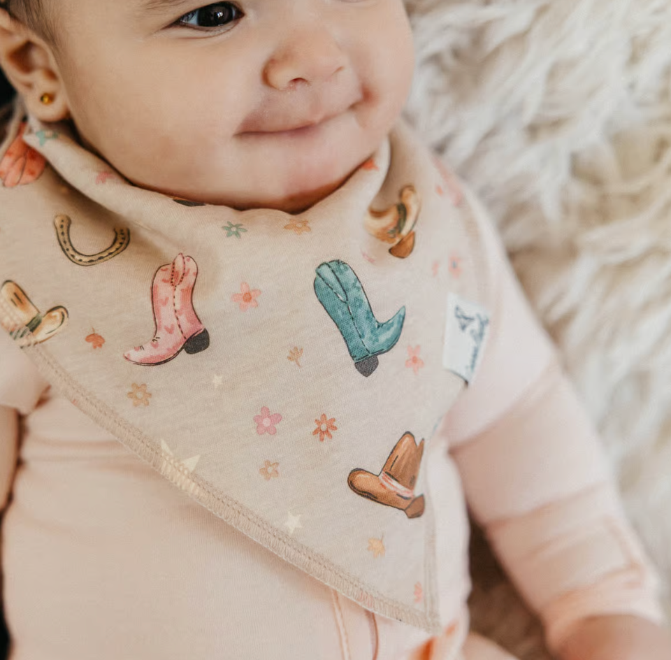 baby wearing cowgirl boot print bandana bib