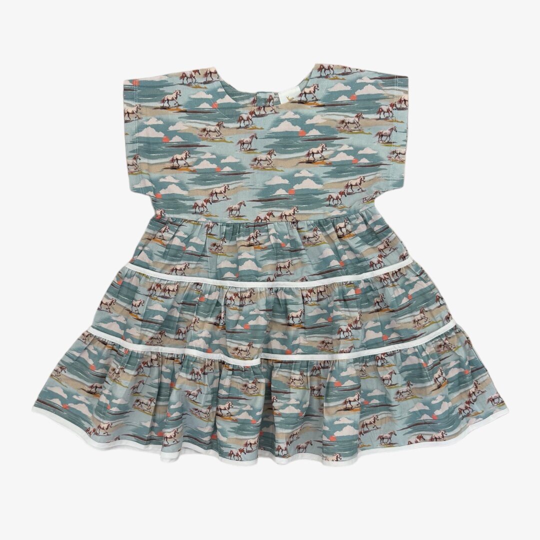 Blue sunset horse print dress for little girl
