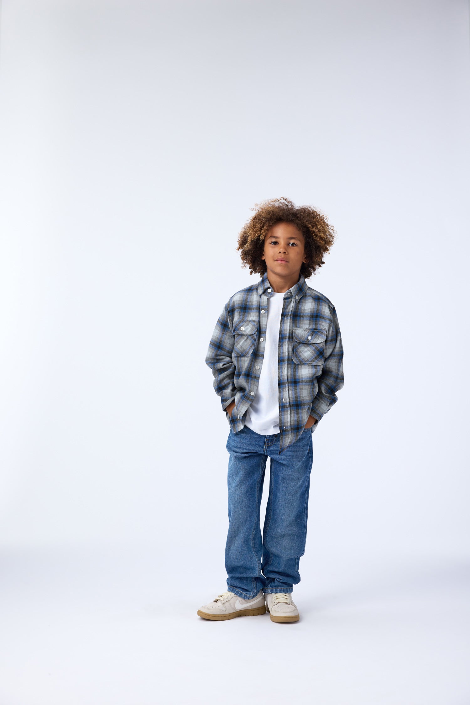 boy in blue plaid shirt