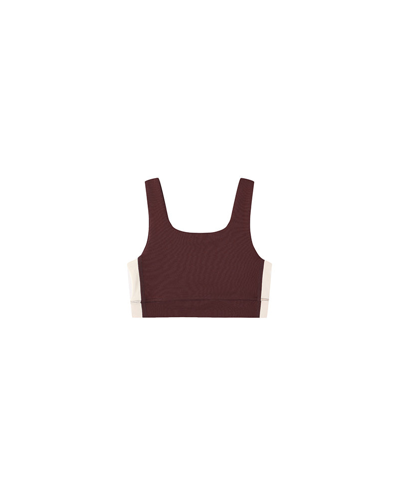 burgundy sports bra with beige side stripe