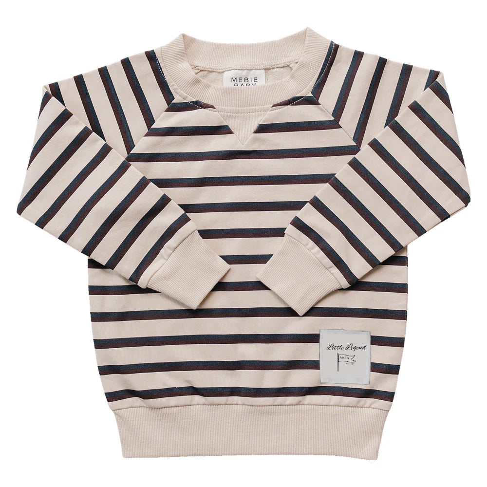 Beige, maroon, and navy striped sweater with brand label on a white background