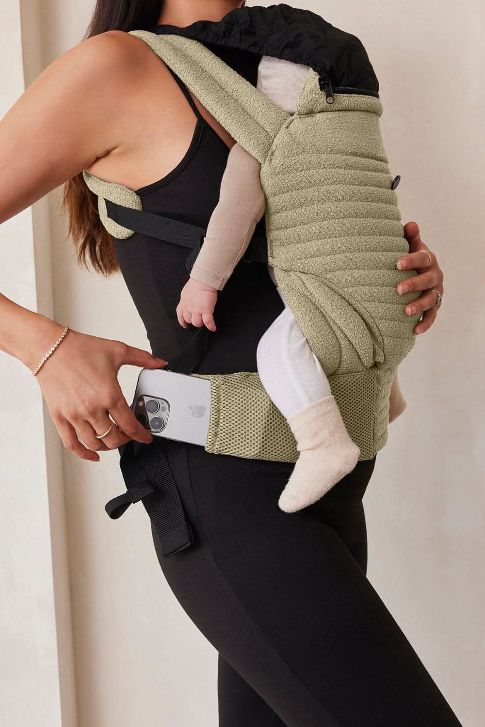 green baby carrier