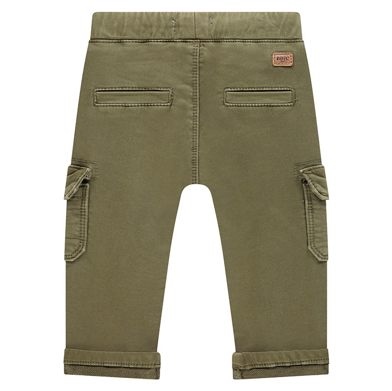 Green cargo pants with a brand label on a white background