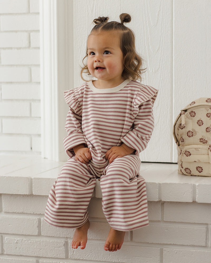 A two-piece baby clothing set featuring a long-sleeve top and matching pants. The set has a horizontal stripe pattern in dusty rose and white, with a white drawstring on the pants and ruffle details on the top.