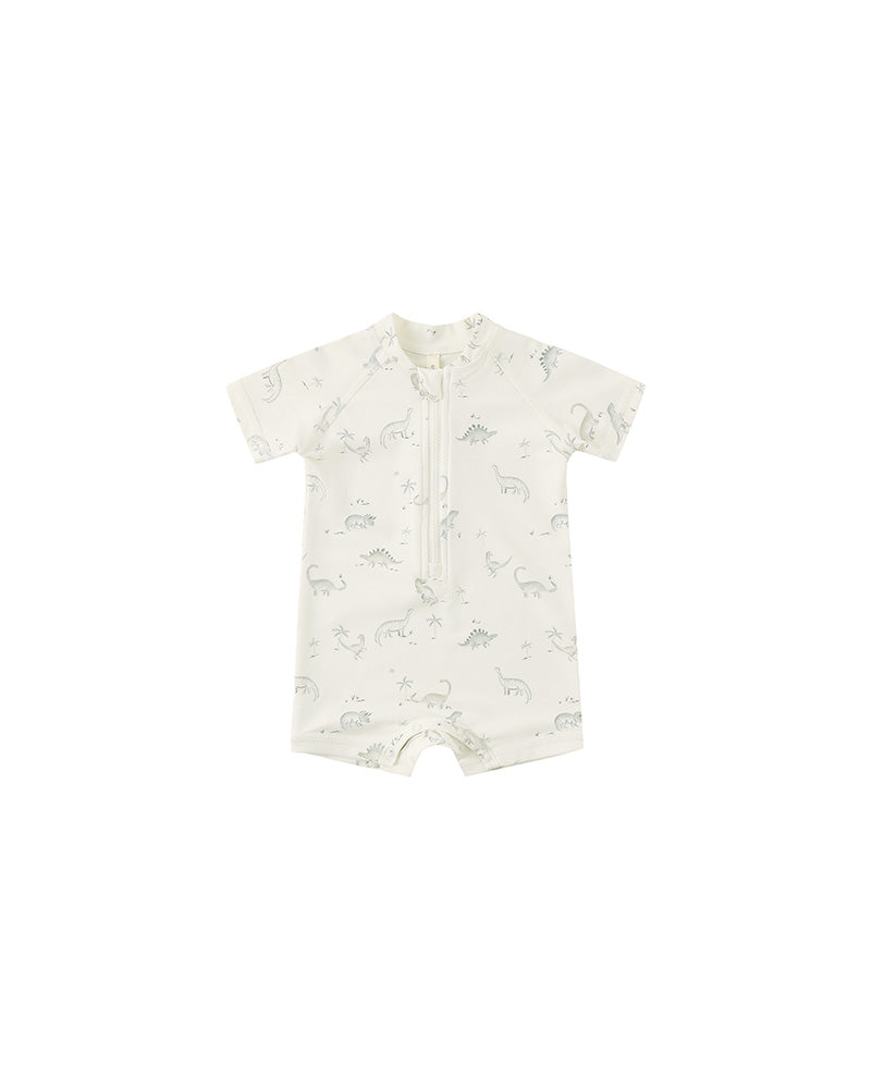 Baby swimsuit with animal pattern on a white background