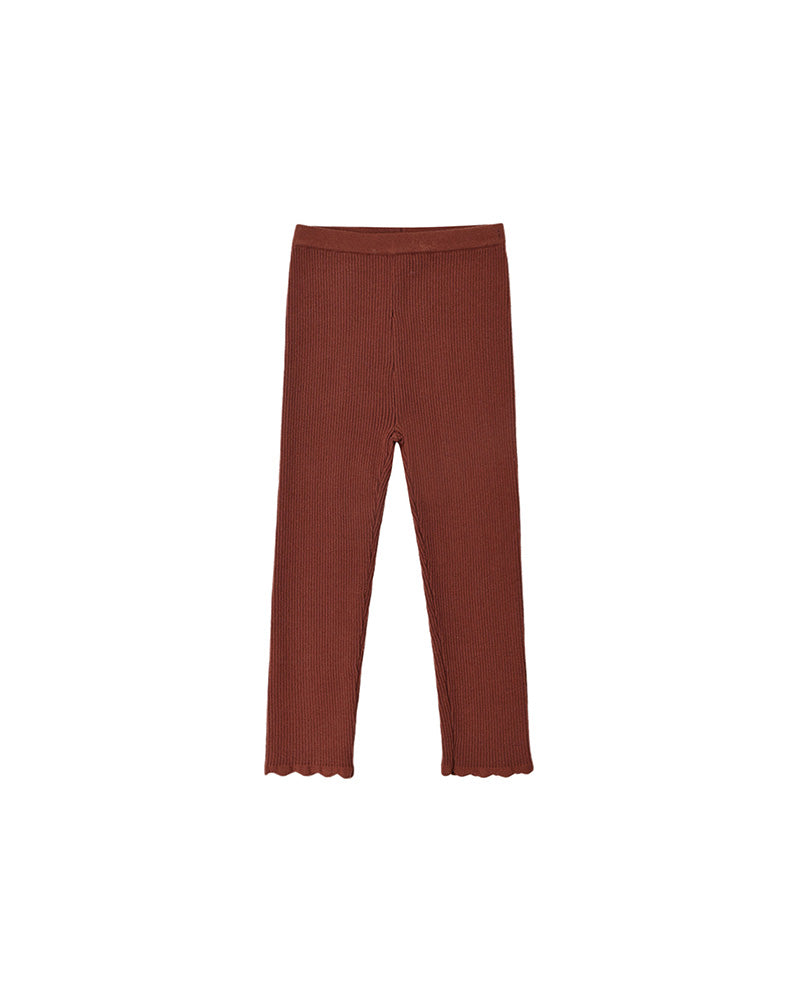 A pair of solid rust-colored ribbed leggings with scalloped hems, displayed flat against a plain white background.