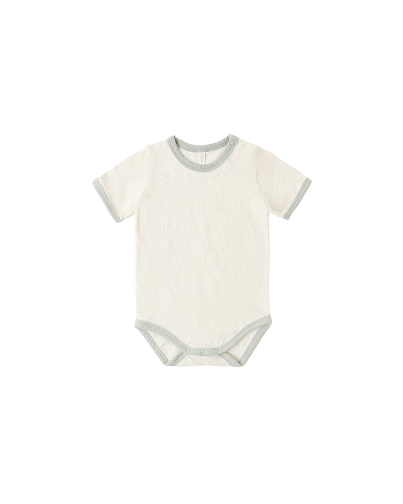 Baby bodysuit with short sleeves on a white background