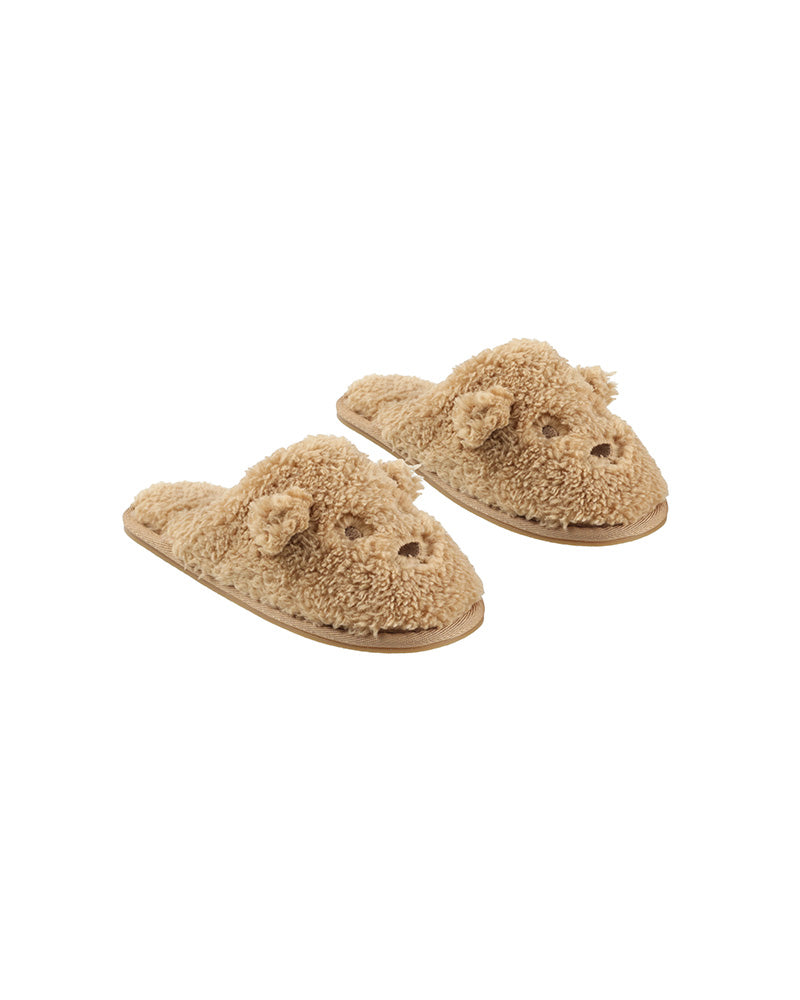 Pair of tan slippers with animal face design on a white background
