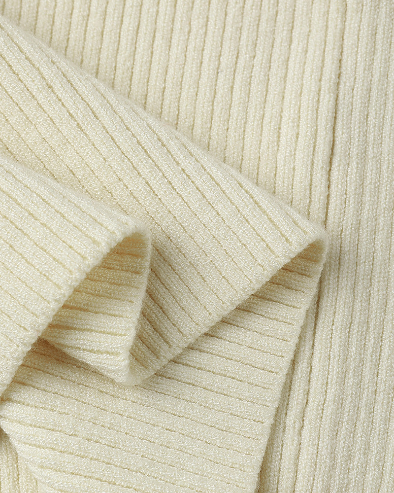 Close-up of beige ribbed fabric with a soft texture