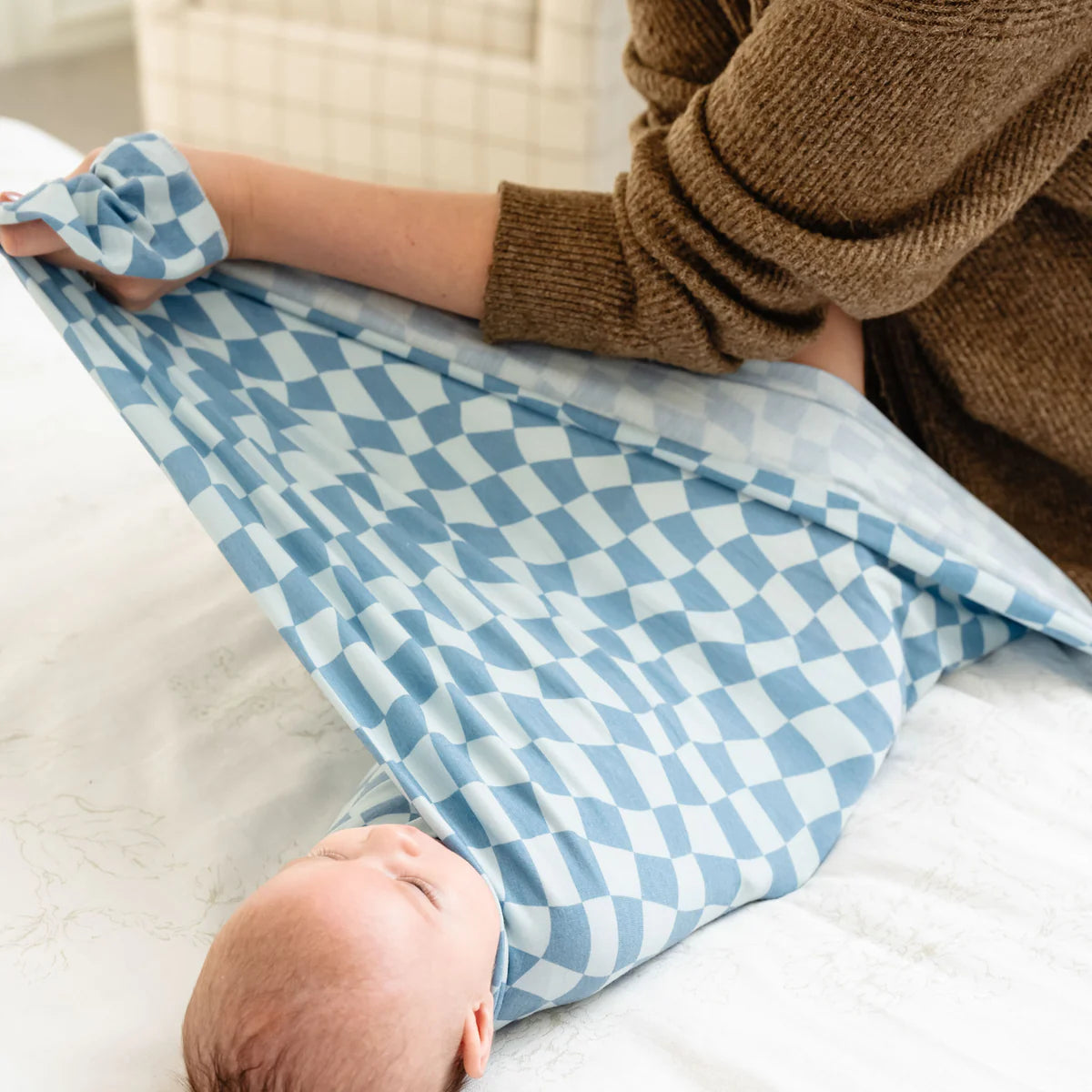 swaddle blanket for babies with blue checkered pattern
