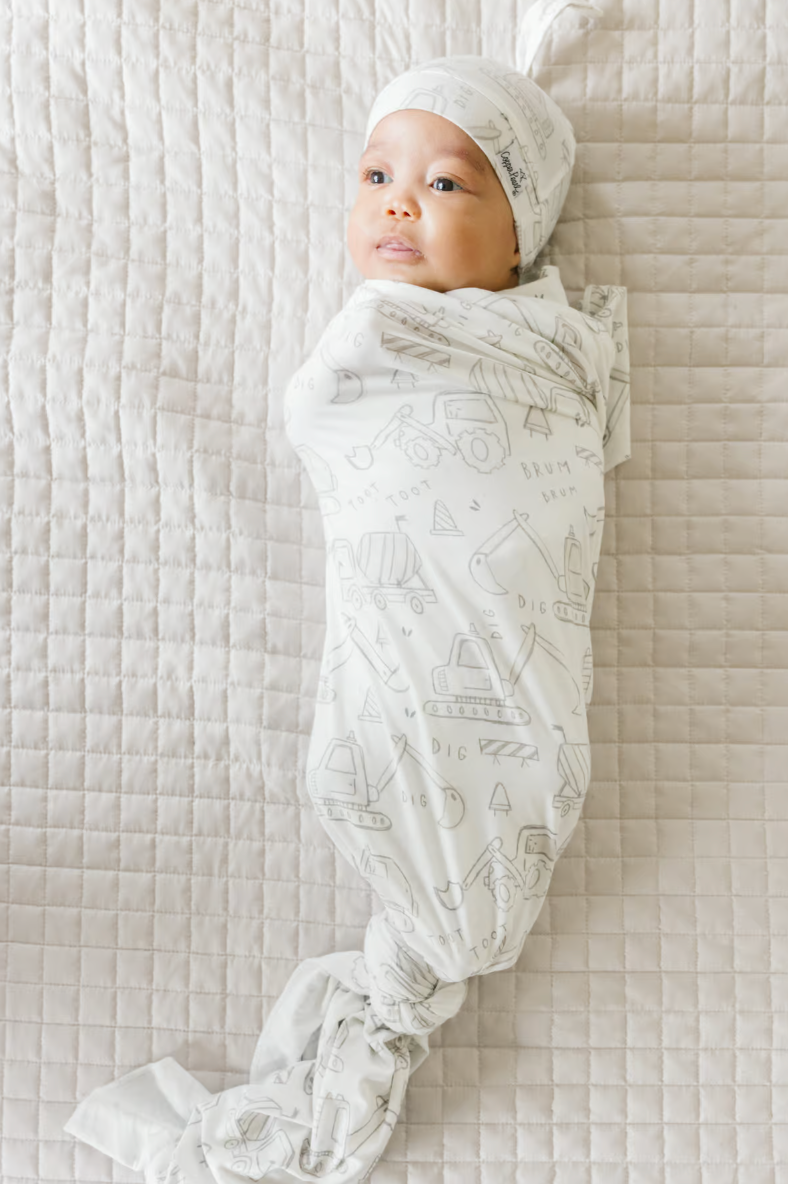 swaddle for babies with construction tools and trucks pattern