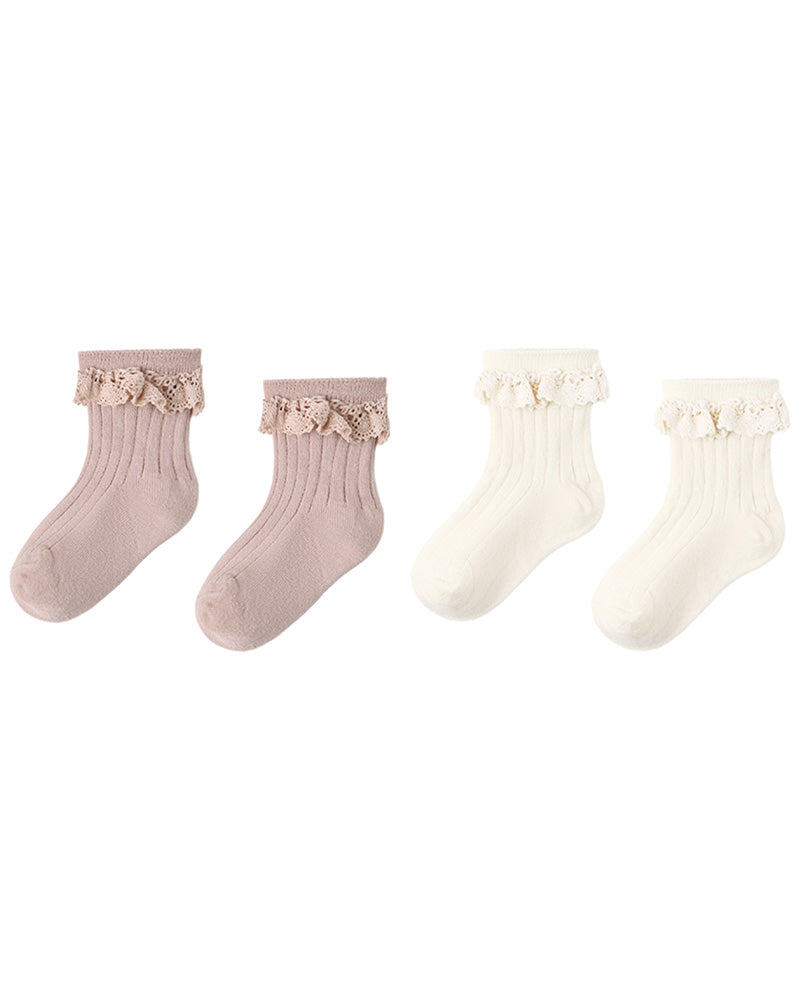 Two pairs of socks, one pink and one white, with decorative lace cuff details on a white background.