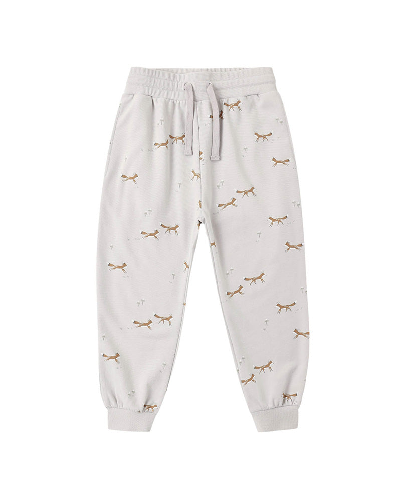 Light gray sweatpants with small fox pattern and a drawstring on a white background