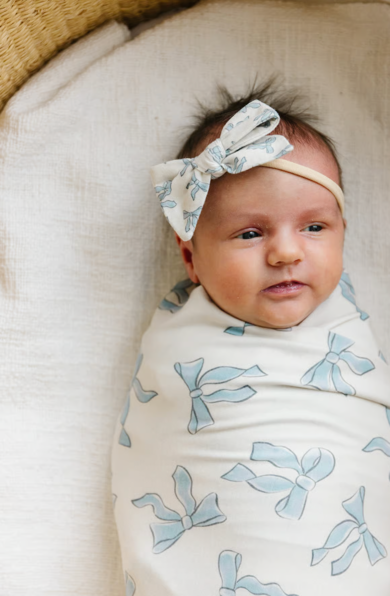 white and blue bow swaddle blanket for babies with matching bow