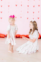 toddler and girl rose and ribbon dress