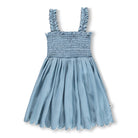 Blue dress with smocked bodice and scalloped hem on a white background