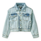Light blue denim jacket on a white background