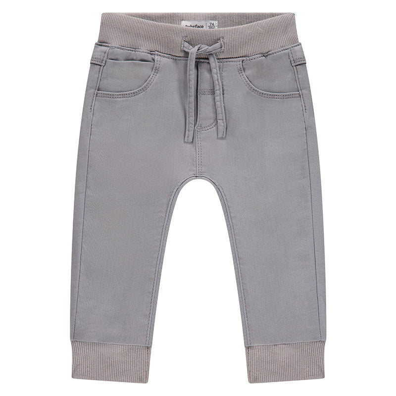 Gray children's pants with a drawstring on a white background