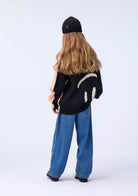 Back of Molo Sweater - Black Smiley