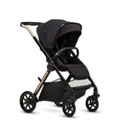 Luxury stroller in black with child seat