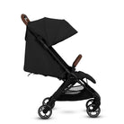 Black stroller with Leather handles on a white background