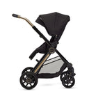 Gold and black Stroller with child seat