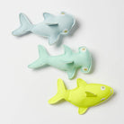 Green and blue shark toys