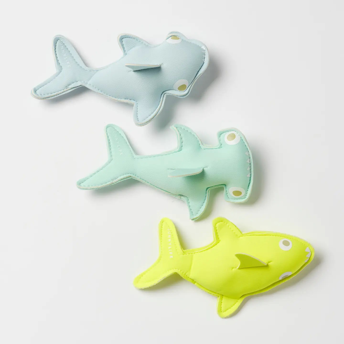 Green and blue shark toys