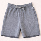 Gray shorts with a drawstring on a white background