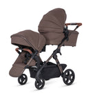 Brown double stroller 