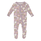 Floral-patterned baby onesie on a white background