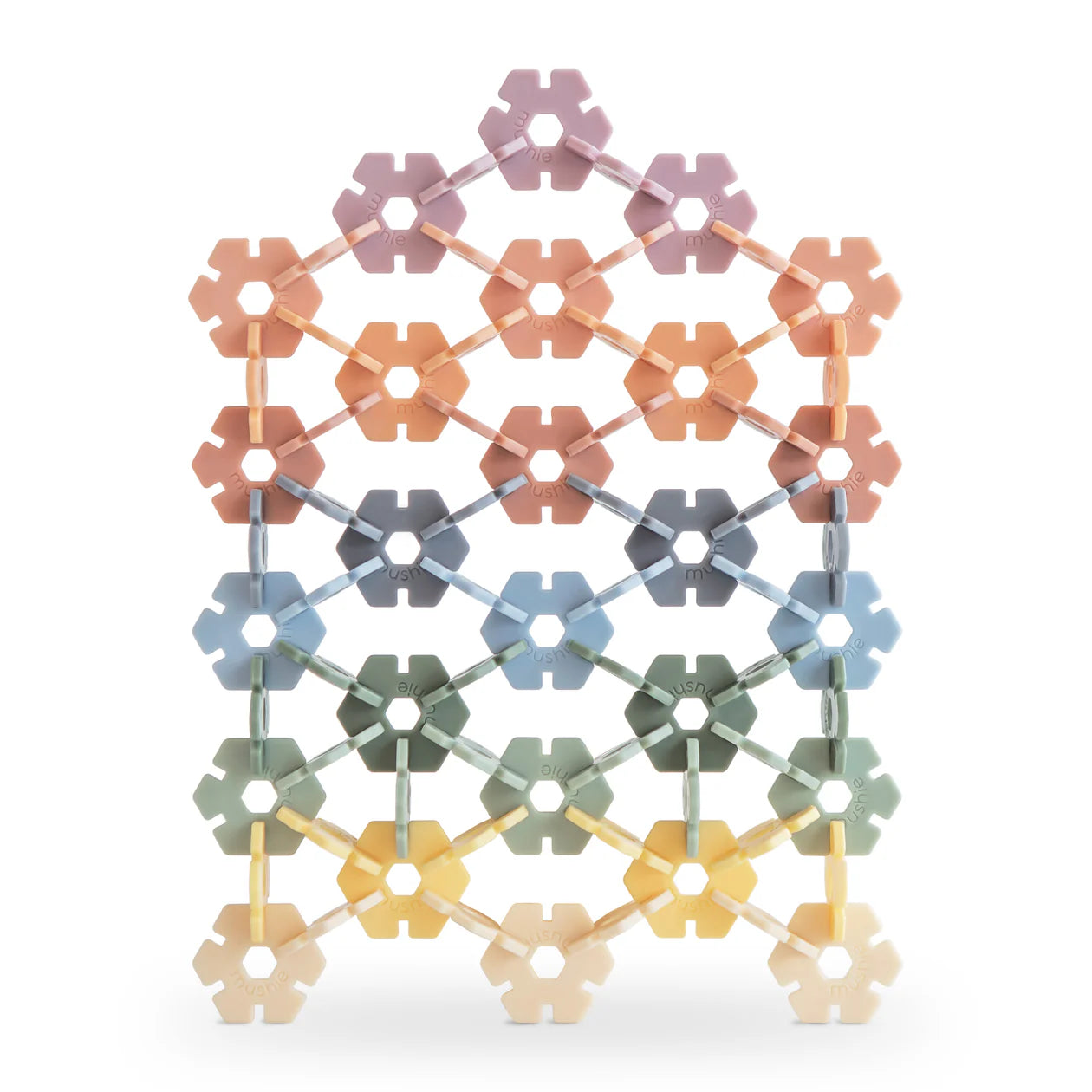 Colorful geometric pattern building toy on a white background