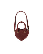 Heart-shaped handbag with a strap 