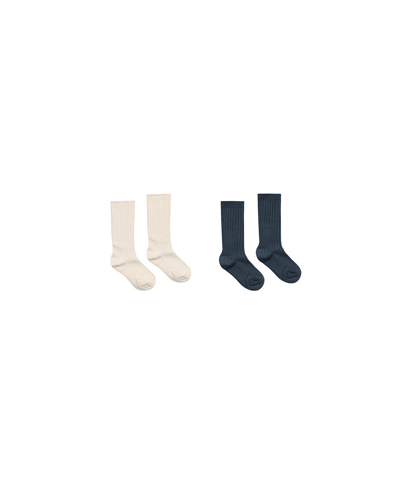 Two pairs of socks, one cream one navy