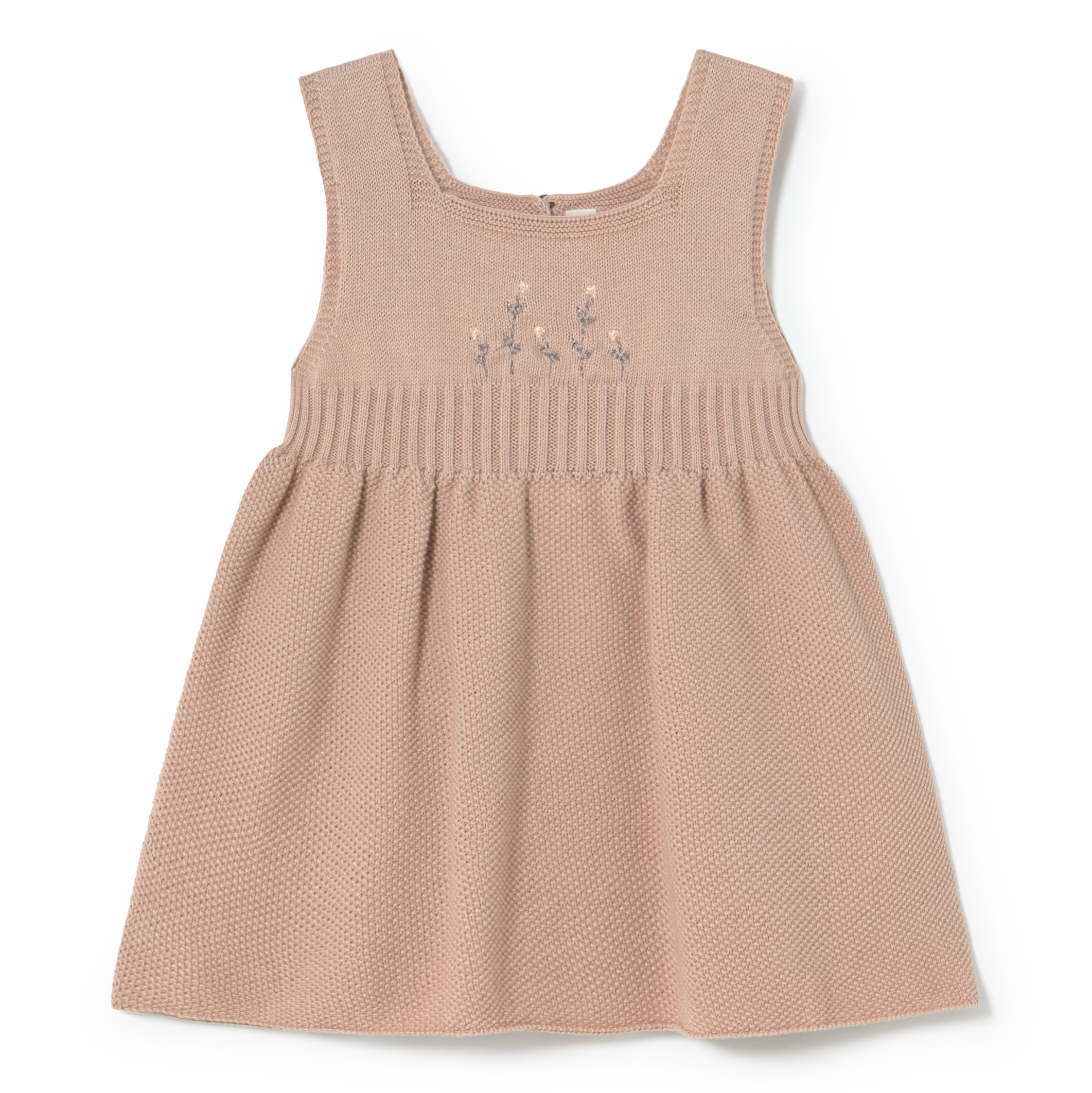 Pink dress with floral embroidery on a white background