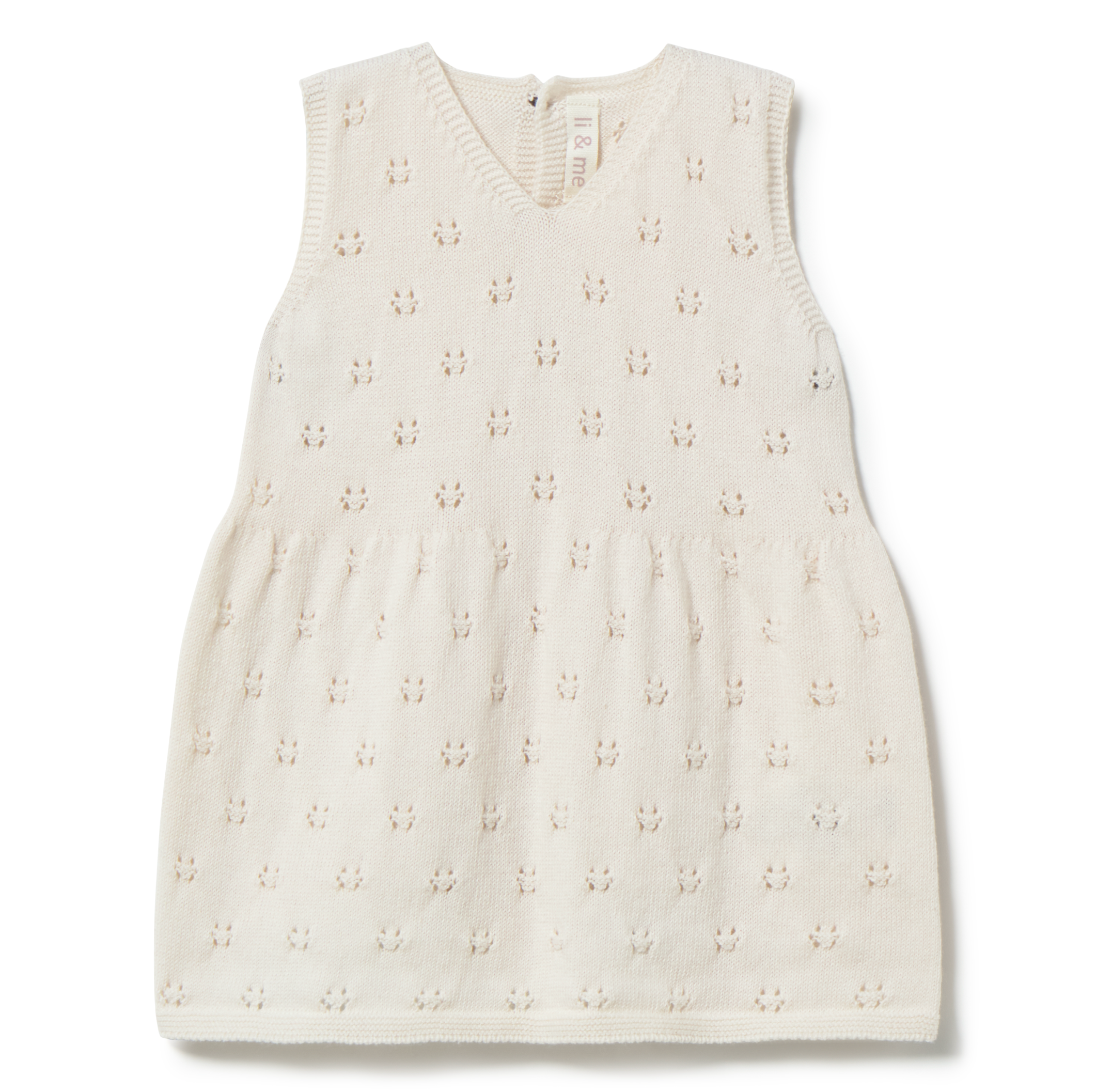 White sleeveless dress with floral pattern on a white background