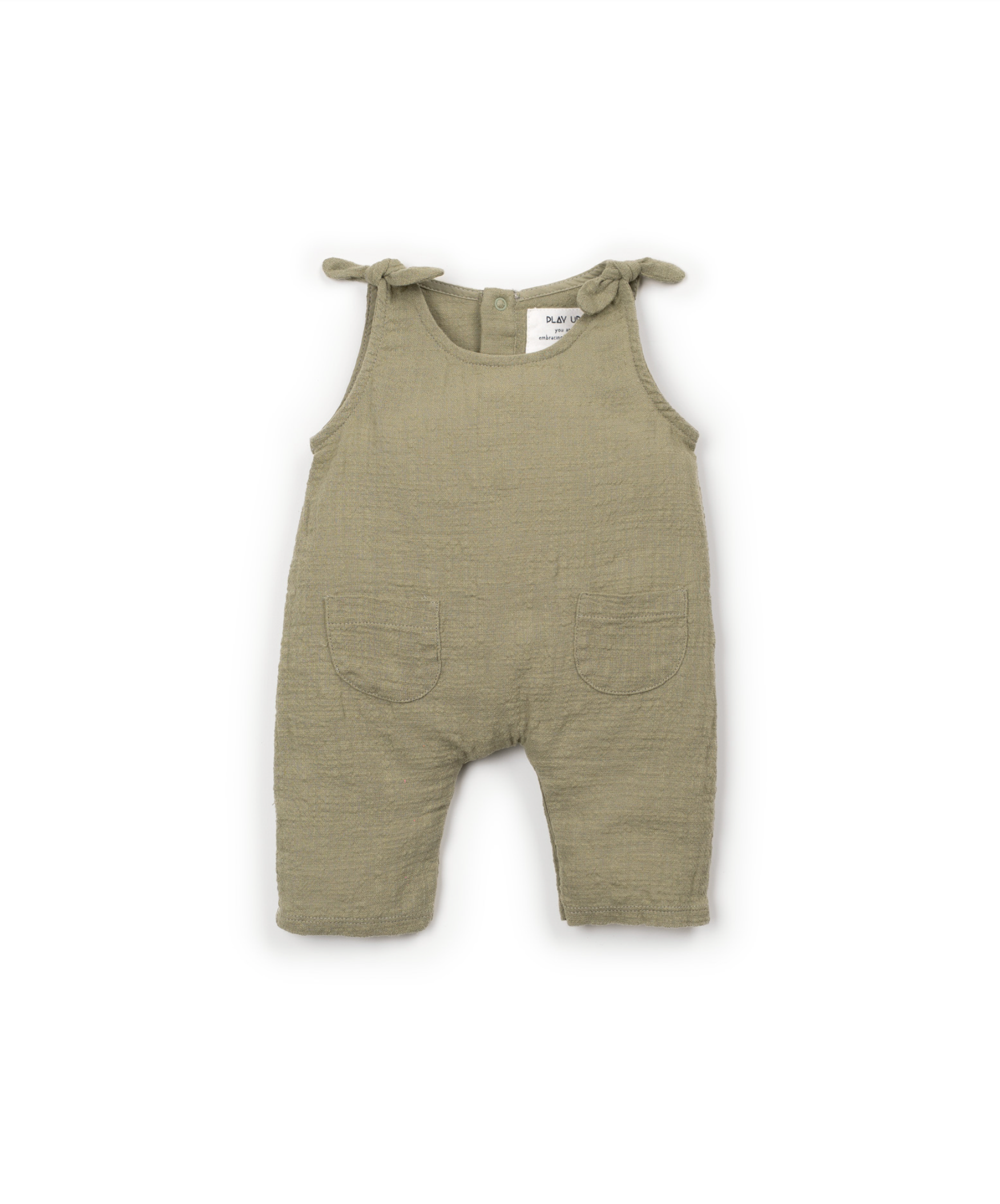 Green baby romper with bow straps and pockets 