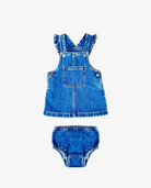 Blue denim pinafore dress with matching bloomers on a white background
