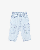 Light blue denim pants with floral embroidery on a white background