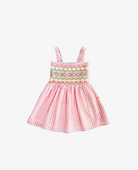 Red and white checkered dress with floral smocking on a white background